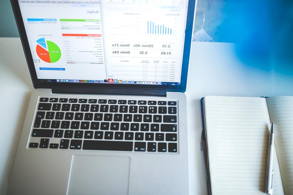 Chart showing upward trend in analytics on a laptop screen